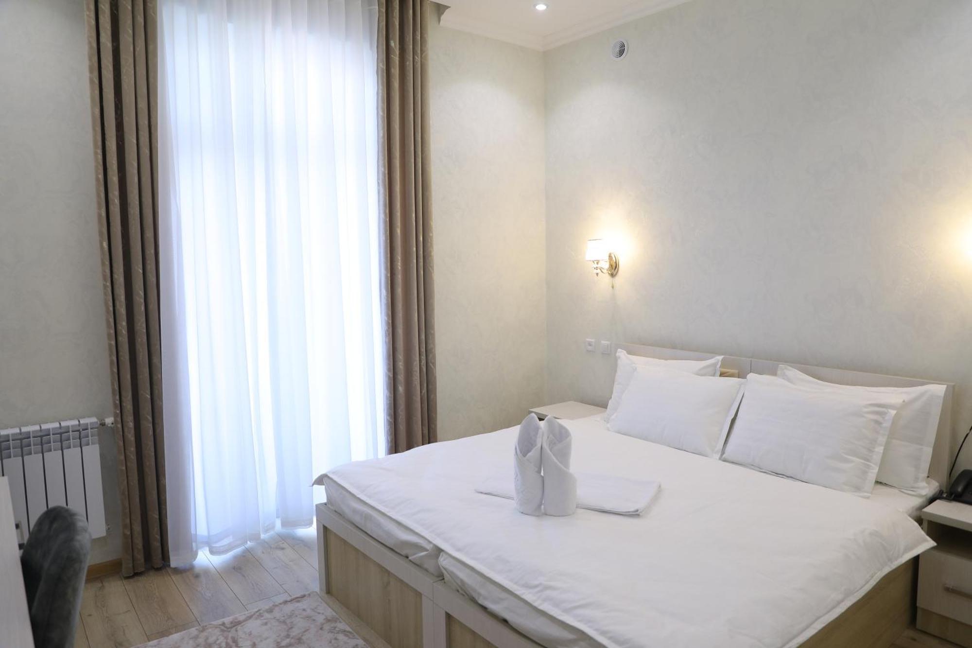 Status Hotel Карши Экстерьер фото