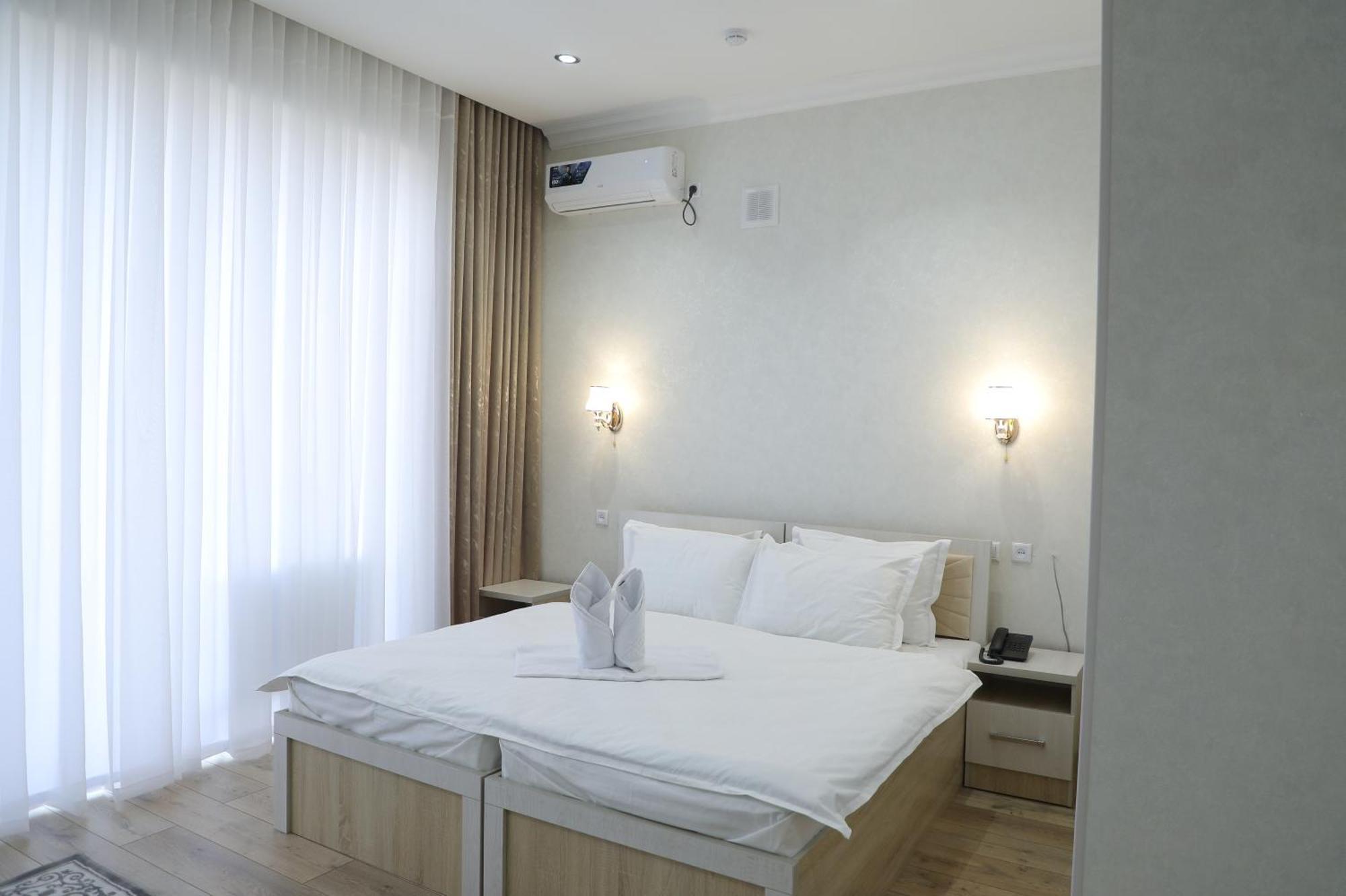 Status Hotel Карши Экстерьер фото