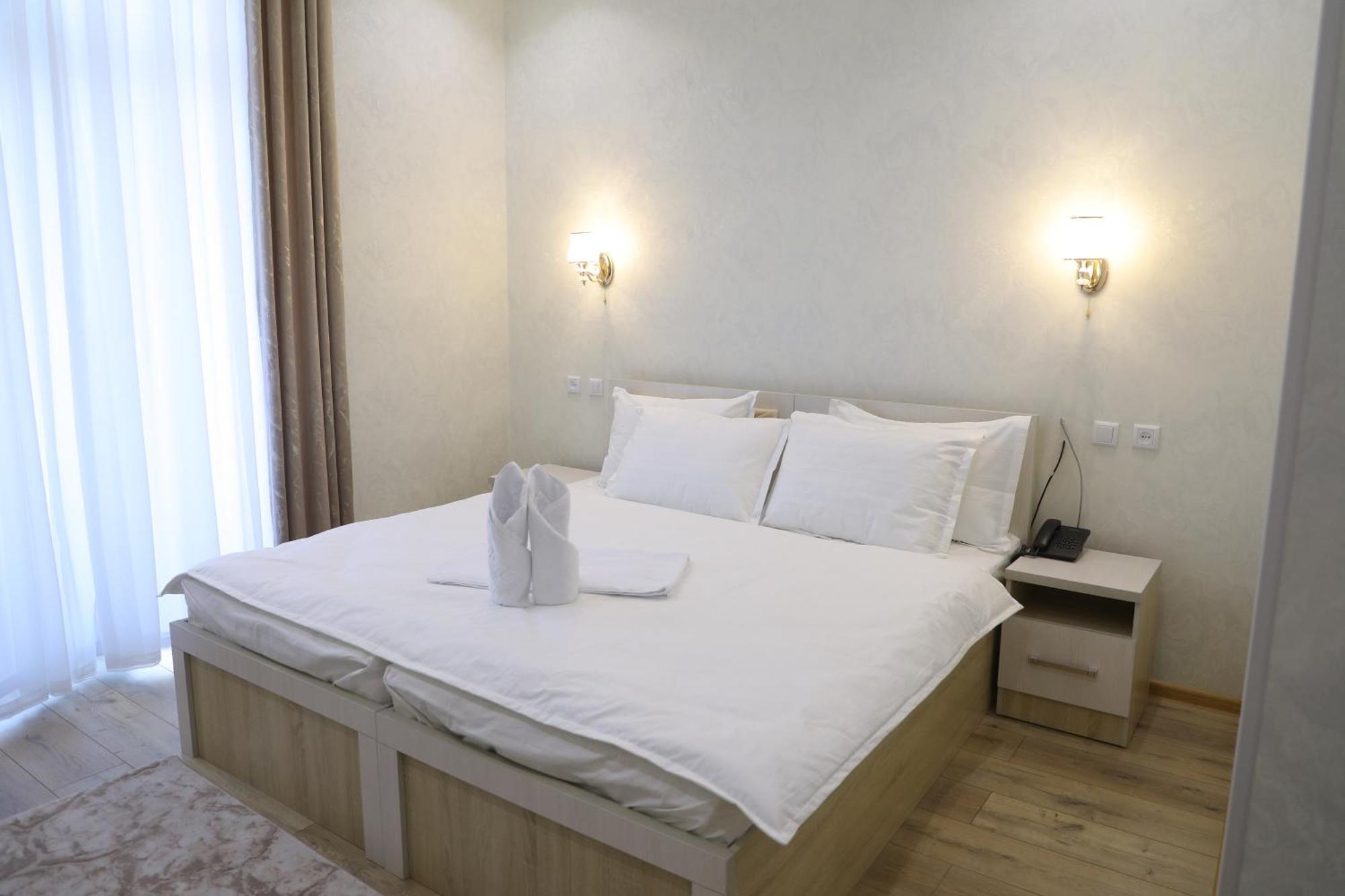 Status Hotel Карши Экстерьер фото
